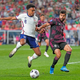 United States’ Weston McKennie (8) goes after a ball with Mexico’s Néstor Araujo (2) during the second half of a CONCACAF Nations League championship Sunday.